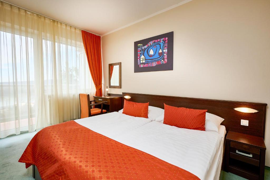 Postel nebo postele na pokoji v ubytování Hotel SOREA REGIA