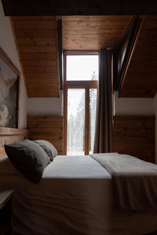 Postel nebo postele na pokoji v ubytování Hotel Cant del Gal