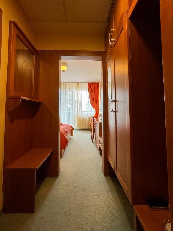 Postel nebo postele na pokoji v ubytování Hotel SOREA REGIA