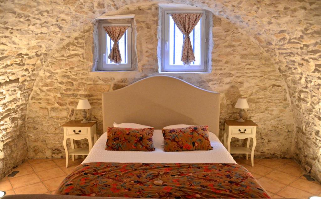 Postel nebo postele na pokoji v ubytování LOCUS AMOENUS