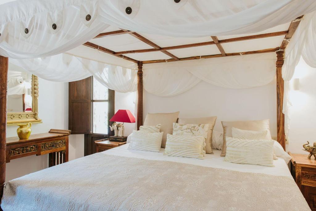 Postel nebo postele na pokoji v ubytování Villa & Guesthouse Paissa d'en Bernat