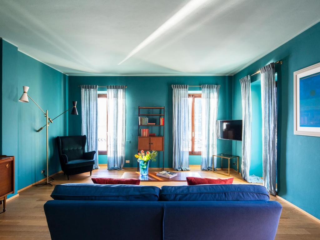 A seating area at Domus Plinii 1792 Suites