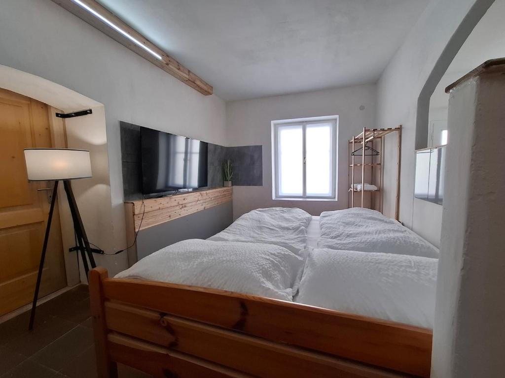 Postel nebo postele na pokoji v ubytování Apartmán pro dva