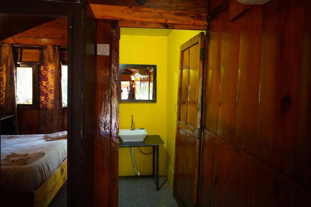 Postel nebo postele na pokoji v ubytování Sameer beachfront Cottages