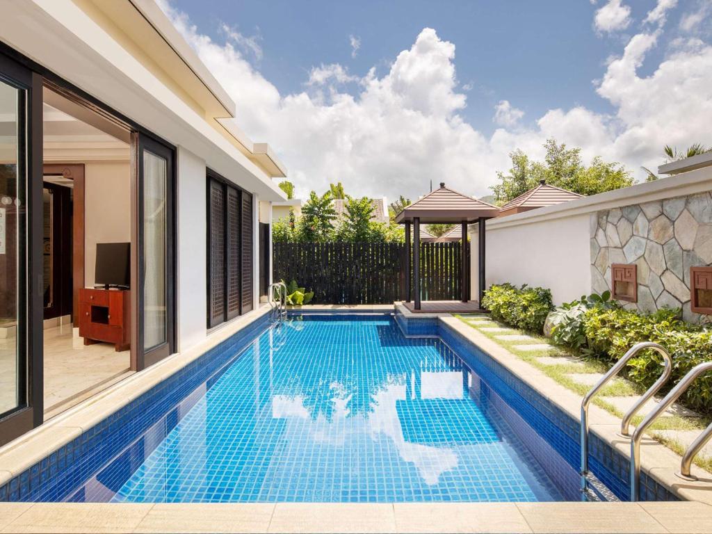 Bazén v ubytování Pullman Sanya Yalong Bay Villas & Resort nebo v jeho okolí