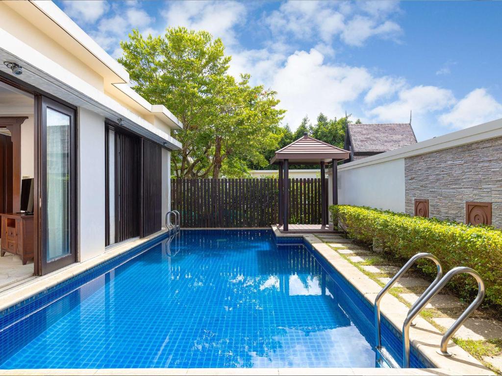 Bazén v ubytování Pullman Sanya Yalong Bay Villas & Resort nebo v jeho okolí