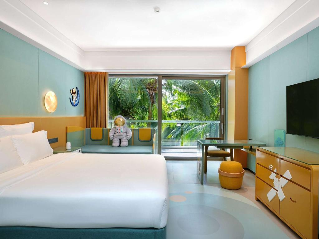 TV a/nebo společenská místnost v ubytování Pullman Oceanview Sanya Bay Resort & Spa