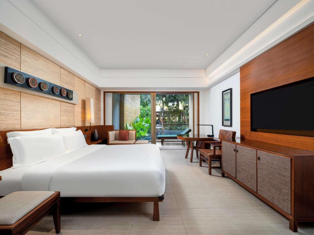 TV a/nebo společenská místnost v ubytování Pullman Oceanview Sanya Bay Resort & Spa