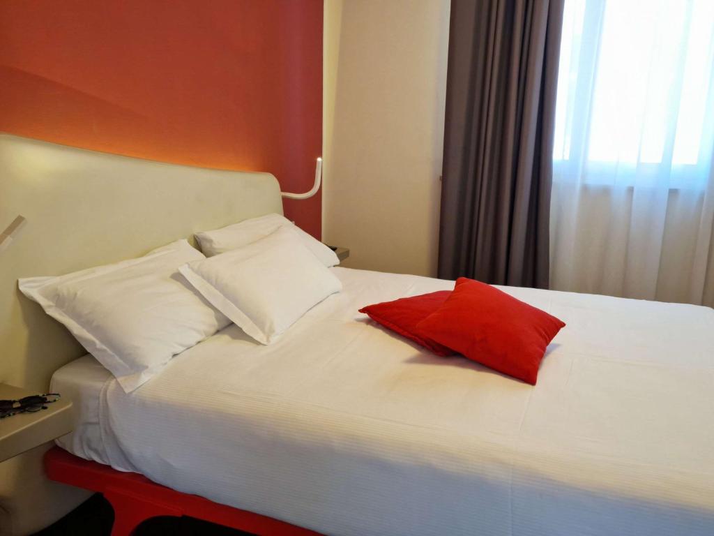 Postel nebo postele na pokoji v ubytování Ibis Styles Palermo President