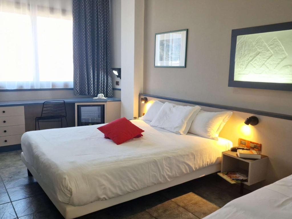 Postel nebo postele na pokoji v ubytování Ibis Styles Palermo President