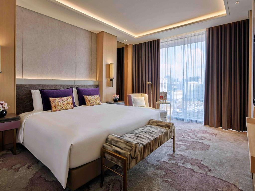Sofitel Singapore City Centre客房内的一张或多张床位
