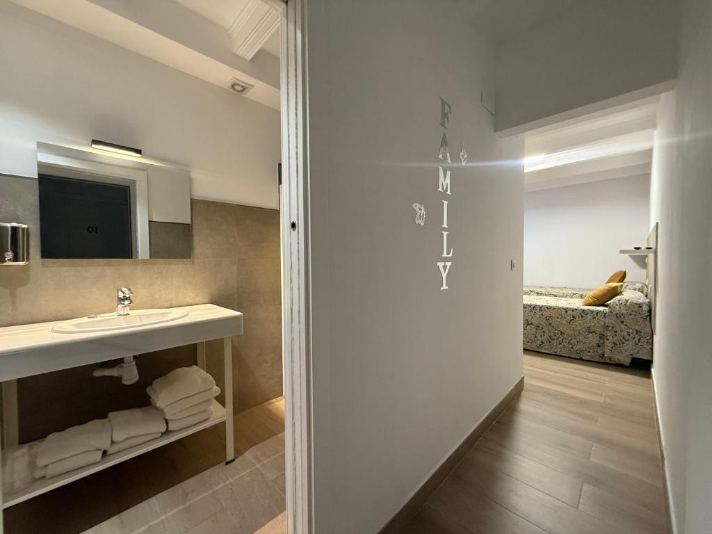 Postel nebo postele na pokoji v ubytování Hotel Quitagolpe