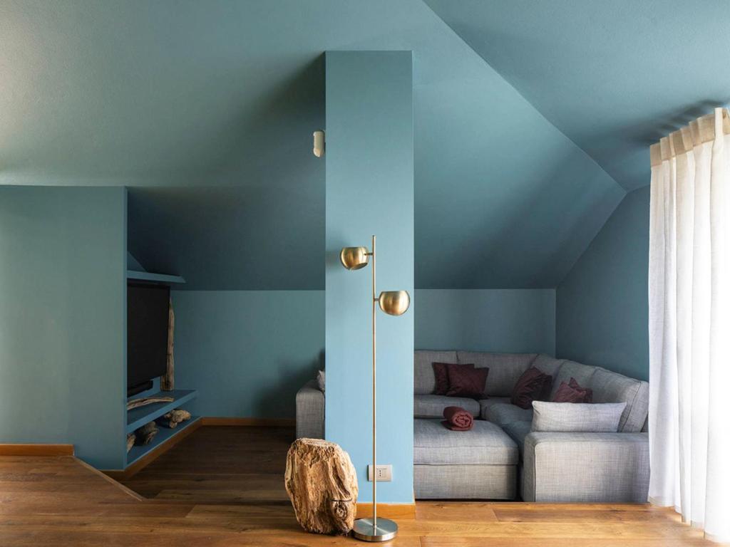 A bed or beds in a room at Domus Plinii 1792 Suites