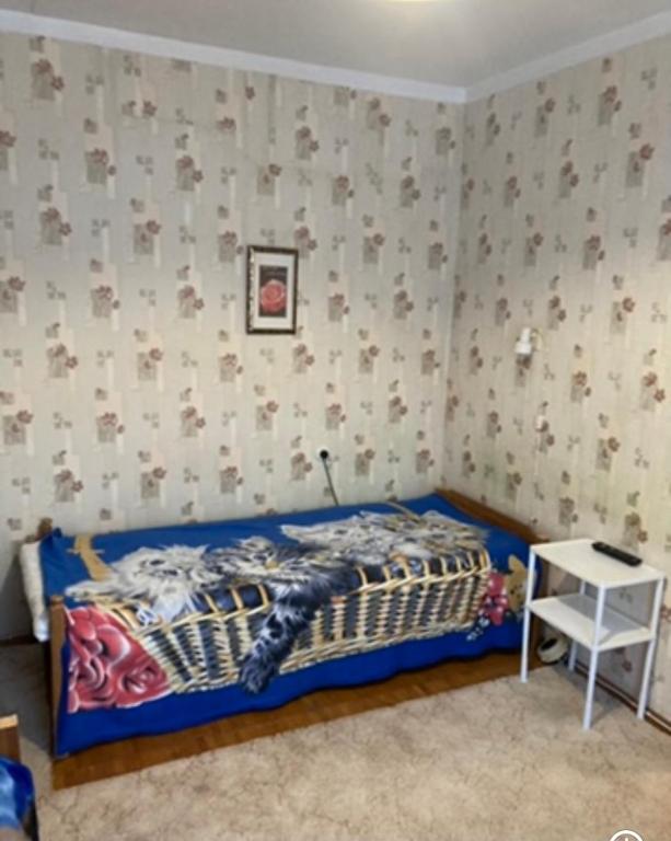 Postel nebo postele na pokoji v ubytování Квартира недалеко от погранпункта