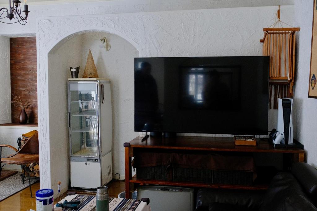 TV a/nebo společenská místnost v ubytování BECK COTTAGE