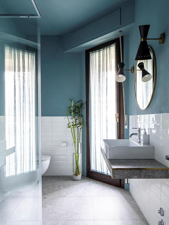 A bed or beds in a room at Domus Plinii 1792 Suites