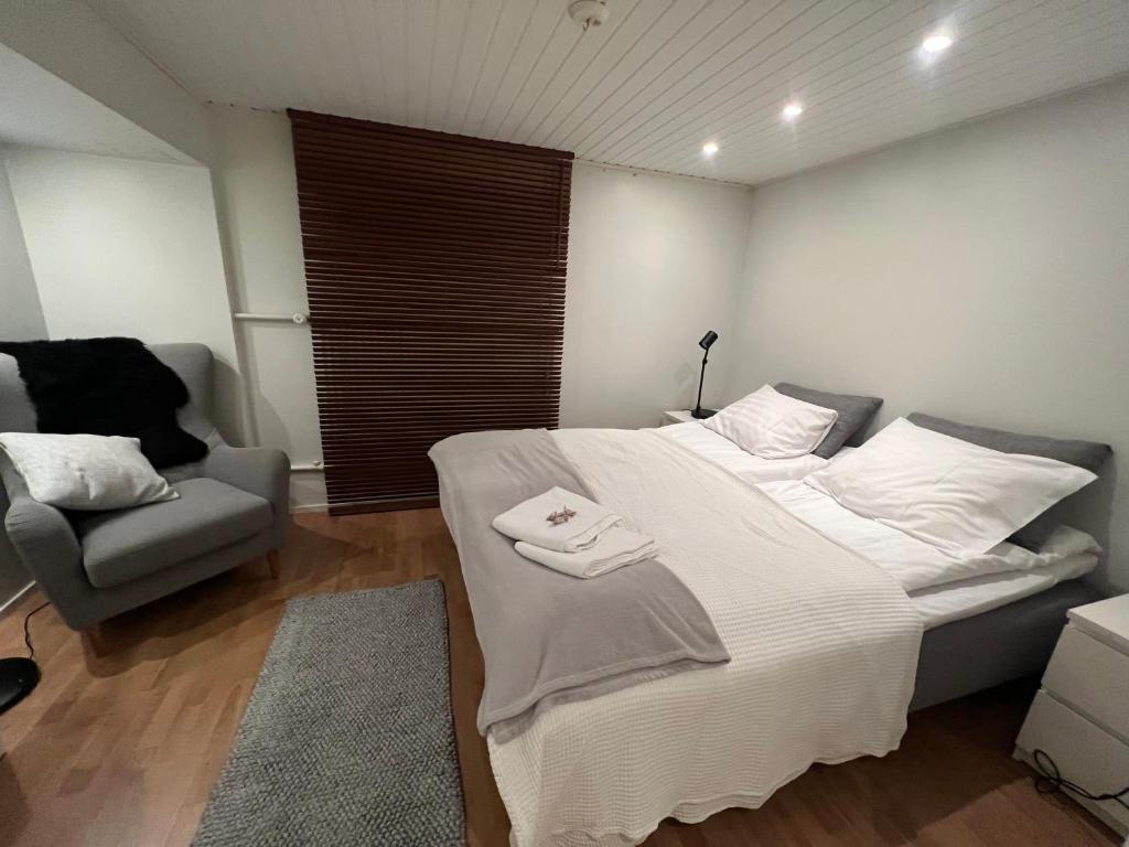 Postel nebo postele na pokoji v ubytování Cityhome Ainola