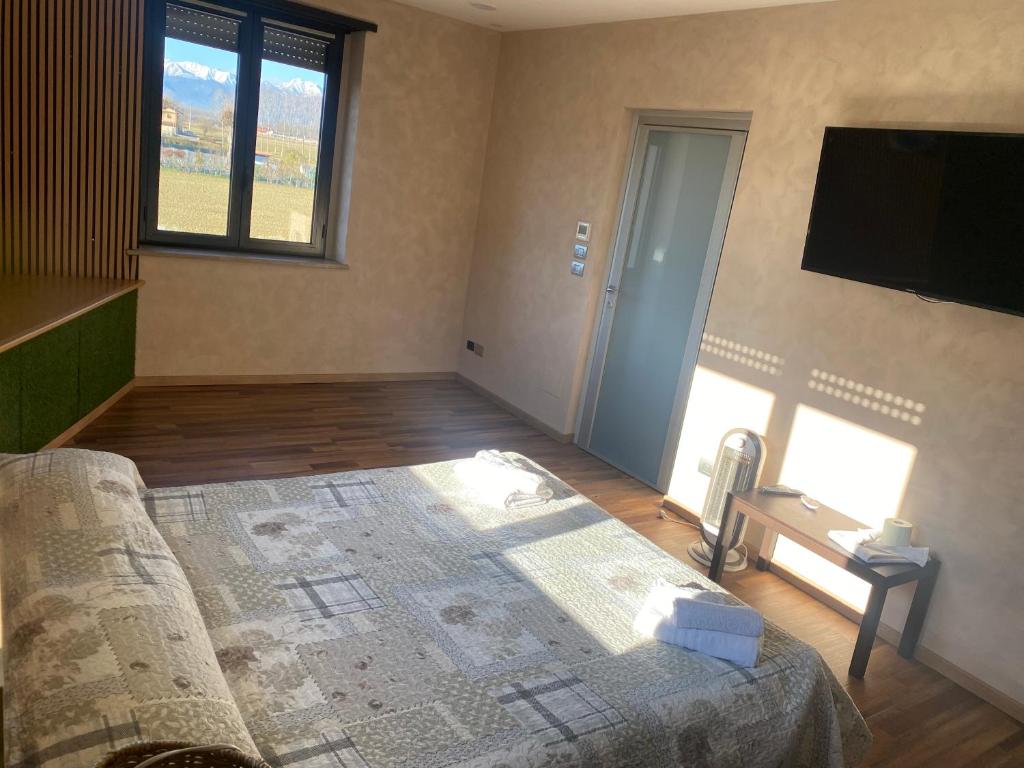 Postel nebo postele na pokoji v ubytování NONE Holiday HOTEL