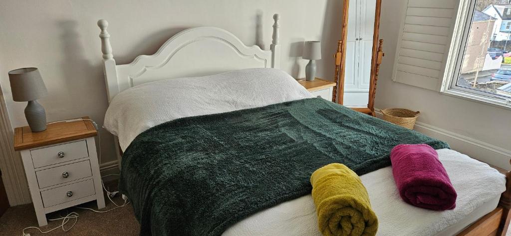 Ένα ή περισσότερα κρεβάτια σε δωμάτιο στο Room in Beautiful Victorian Home