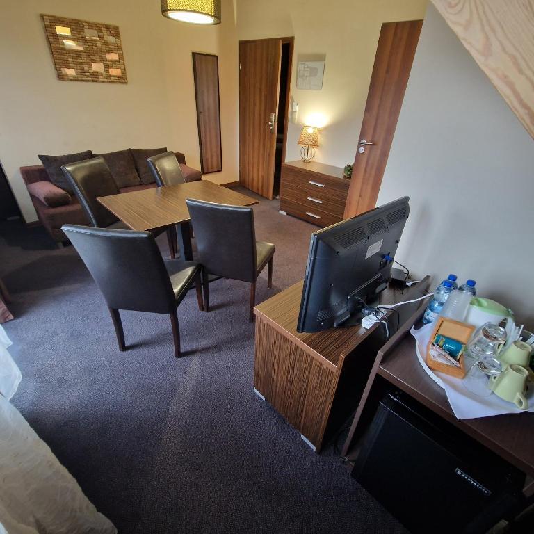 Posedenie v ubytovaní Tajemniczy Ogród Szczytna - Bed & Breakfast
