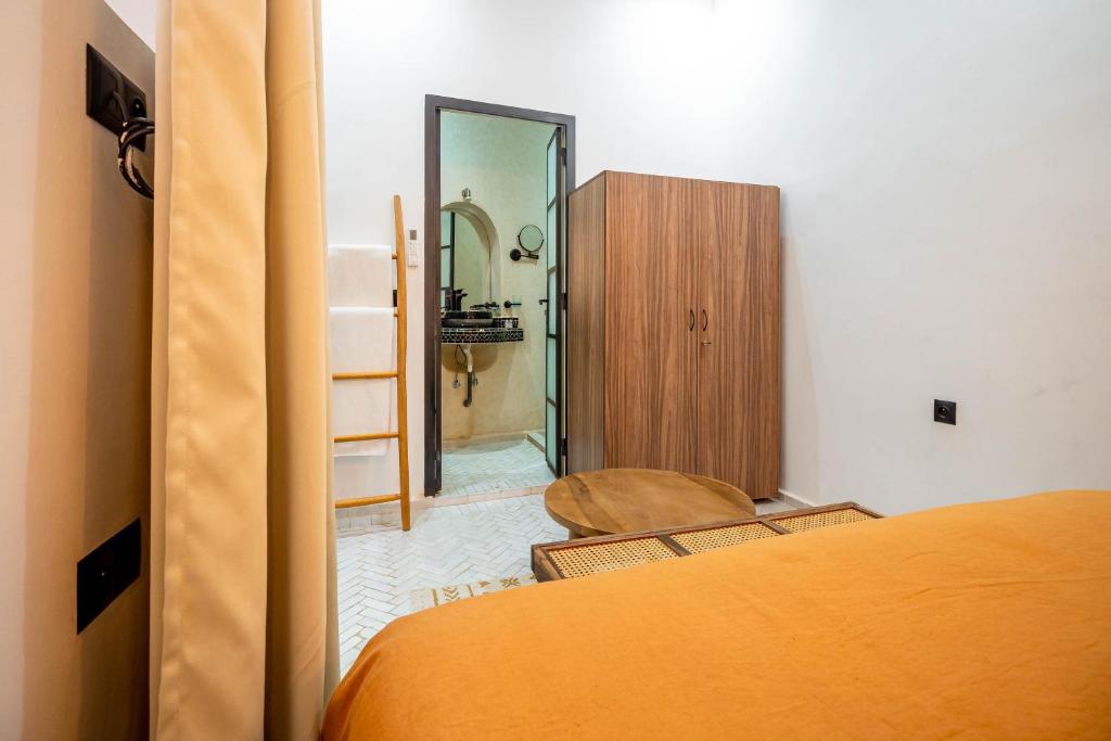 Postel nebo postele na pokoji v ubytování Riad La Croix Berbere Deluxe