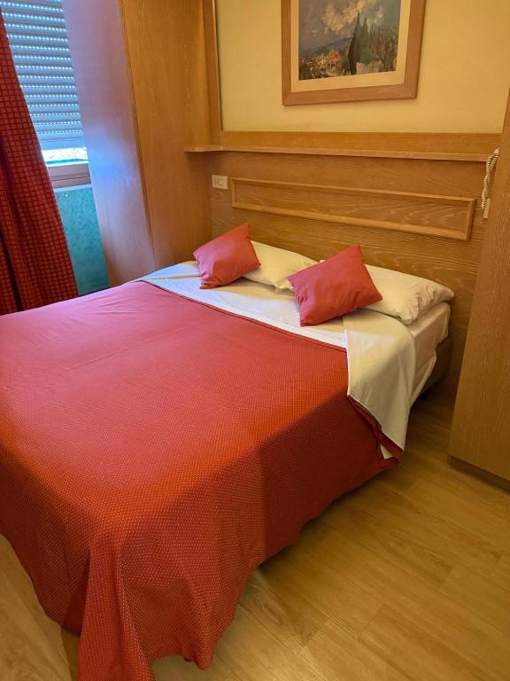 Postel nebo postele na pokoji v ubytování Hotel Meridiana