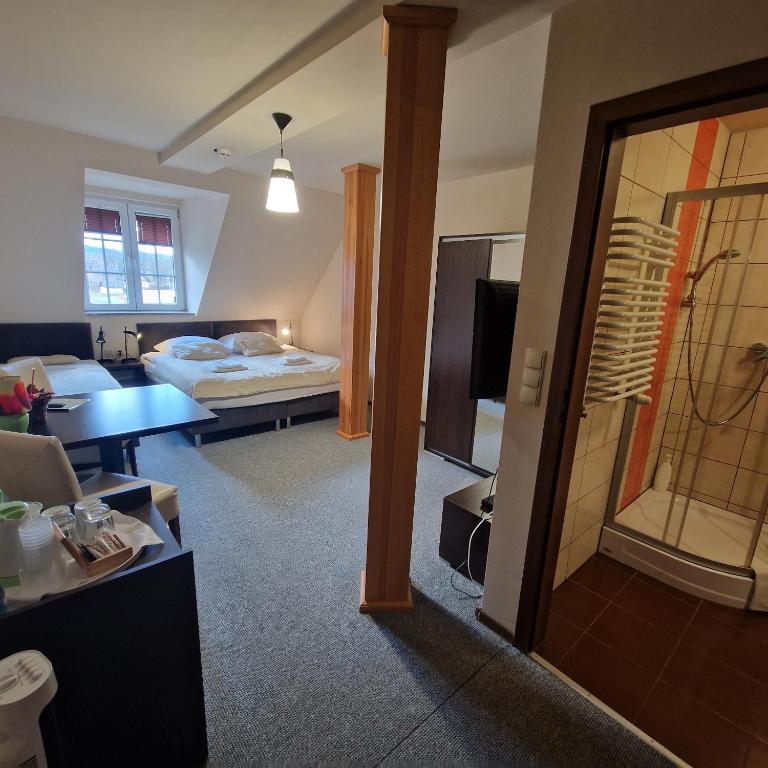 Posteľ alebo postele v izbe v ubytovaní Tajemniczy Ogród Szczytna - Bed & Breakfast