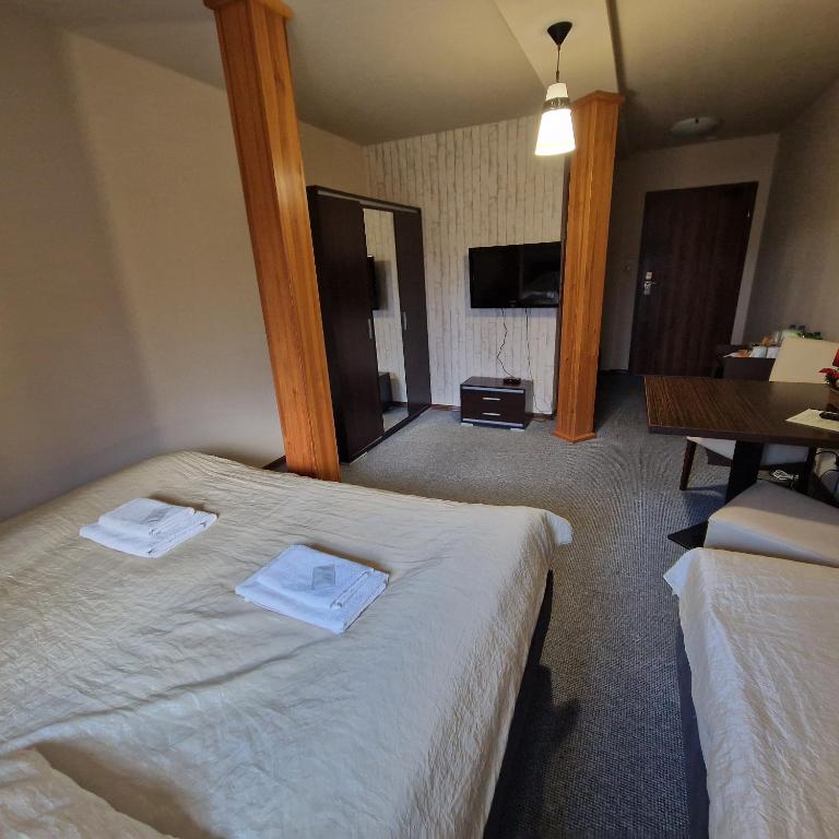Posteľ alebo postele v izbe v ubytovaní Tajemniczy Ogród Szczytna - Bed & Breakfast