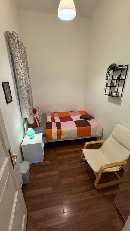 Postelja oz. postelje v sobi nastanitve Home Vibes
