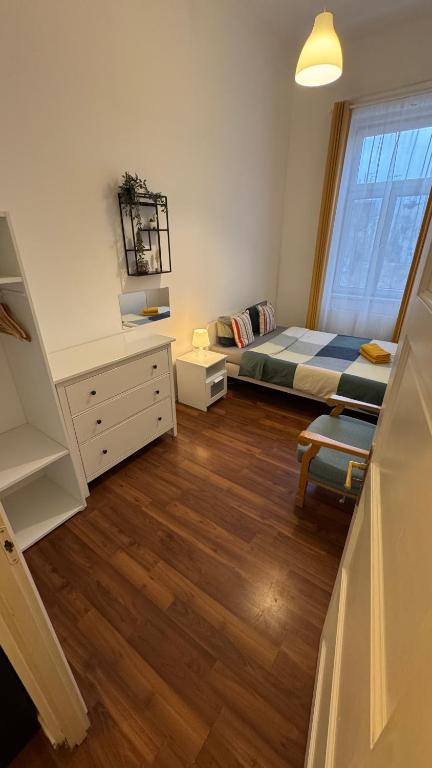 Postelja oz. postelje v sobi nastanitve Home Vibes