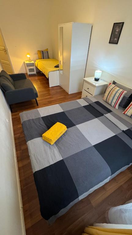 Postelja oz. postelje v sobi nastanitve Home Vibes