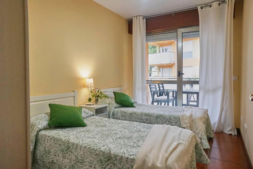 Una cama o camas en una habitación de FGDR322F Cala de la Maza