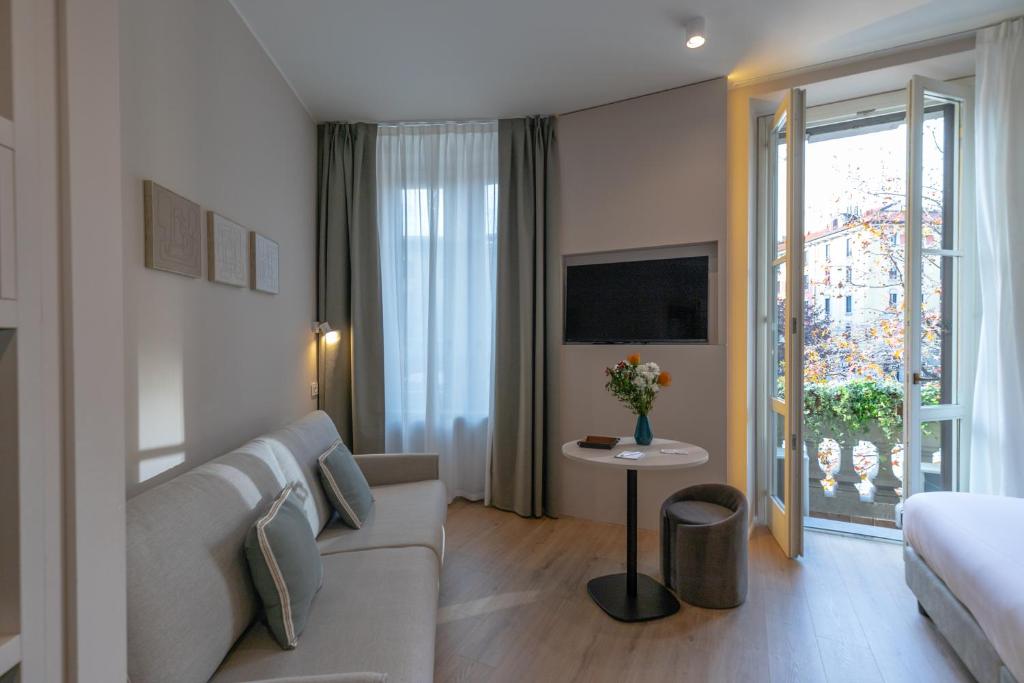 TV a/nebo společenská místnost v ubytování Aiello Hotels - Isola Design District
