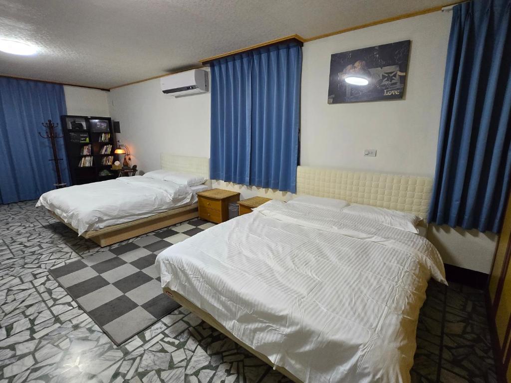 Postel nebo postele na pokoji v ubytování 高鐵中彰309民宿