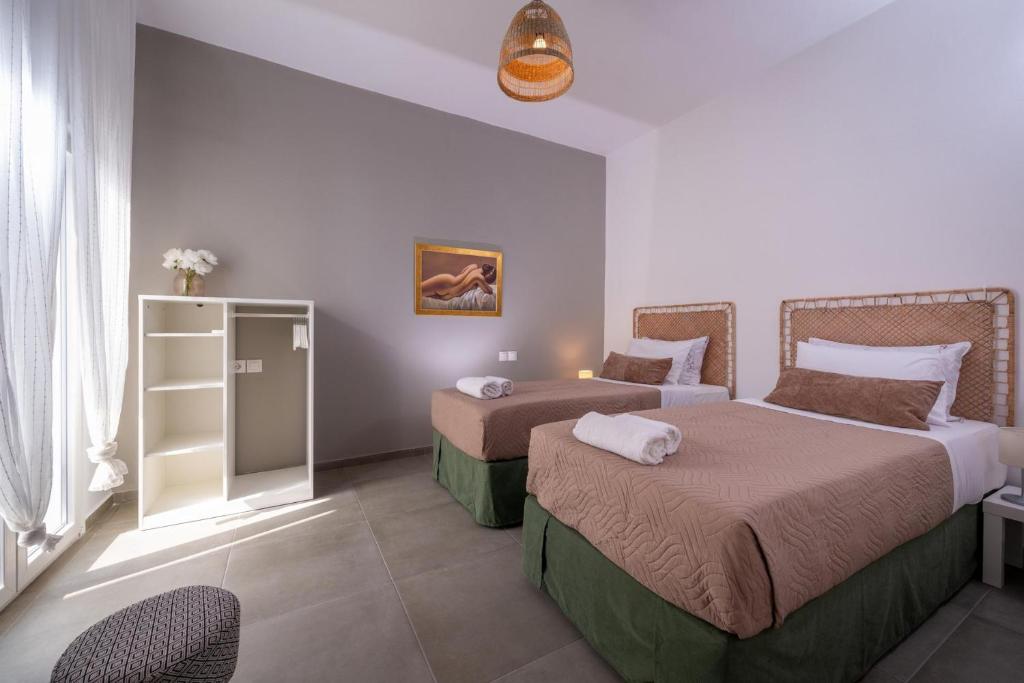 Posteľ alebo postele v izbe v ubytovaní Venezian View Apartment