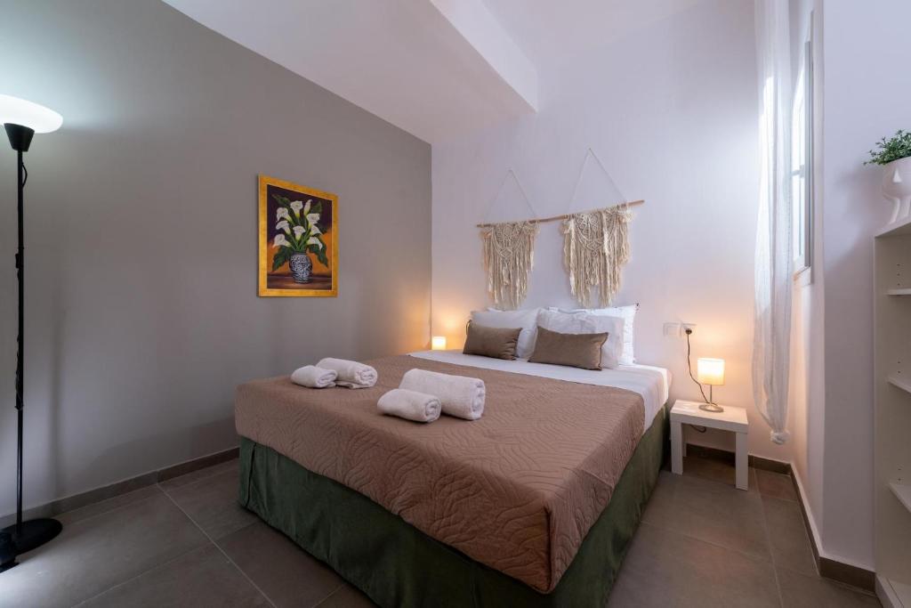 Posteľ alebo postele v izbe v ubytovaní Venezian View Apartment