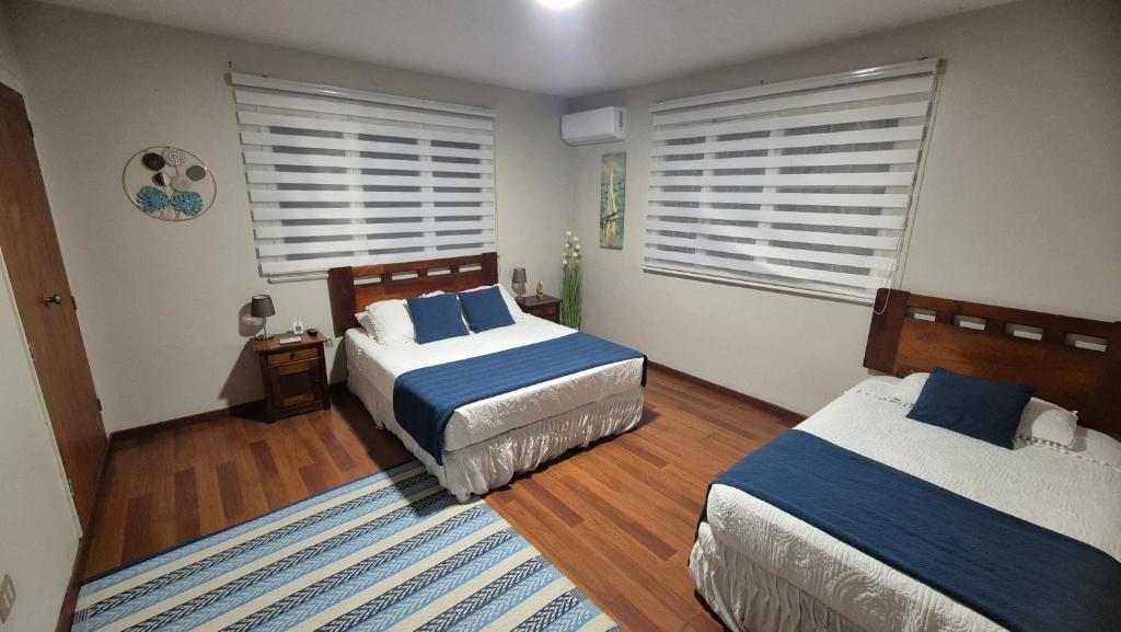 Postel nebo postele na pokoji v ubytování hostal andino