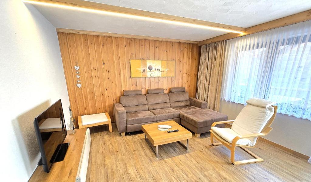 Posezení v ubytování Ferienhaus Adonis