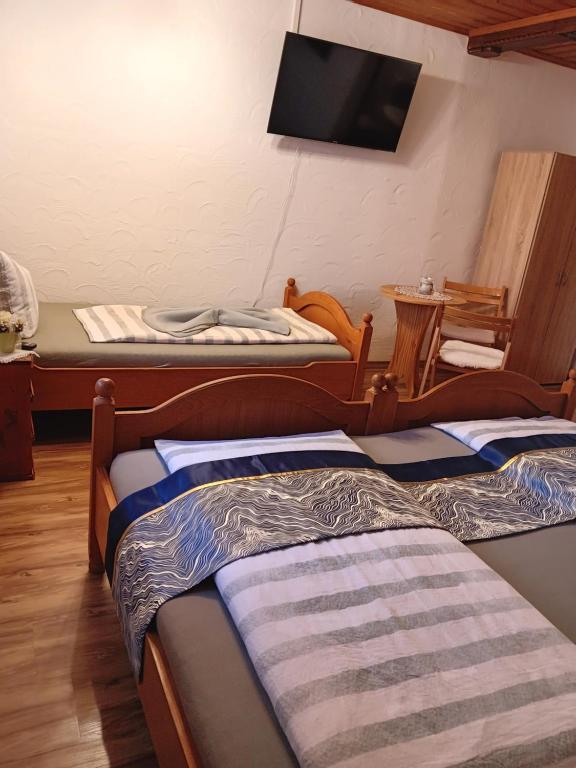 Postel nebo postele na pokoji v ubytování Sonne