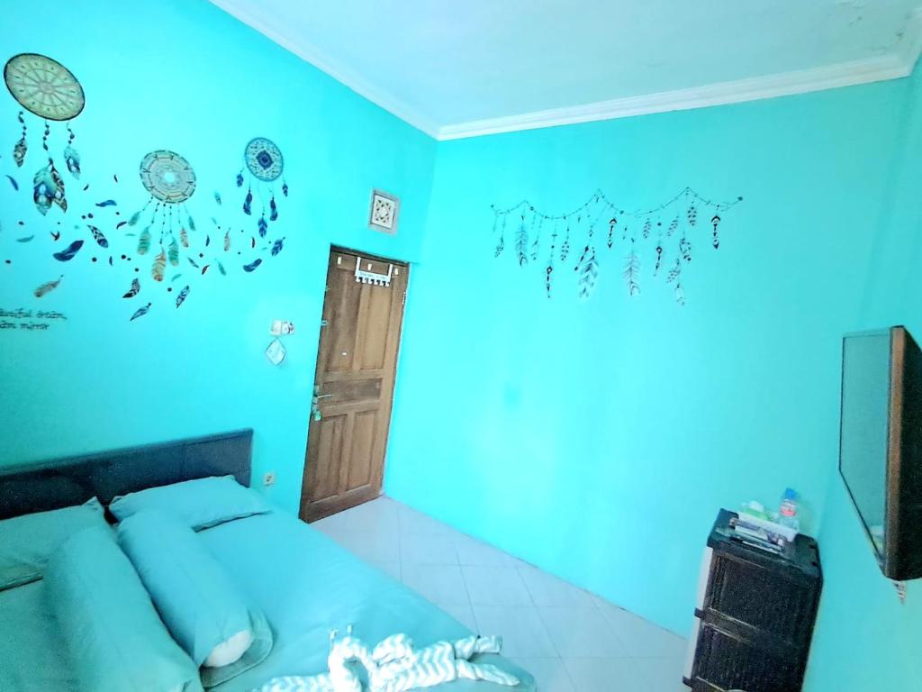TV a/nebo společenská místnost v ubytování Bronk House 1 Malioboro