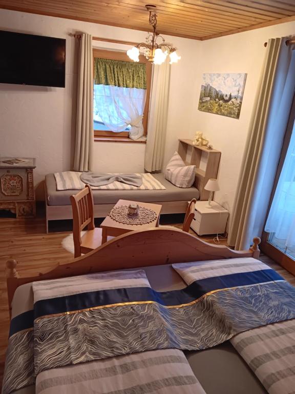 Postel nebo postele na pokoji v ubytování Sonne