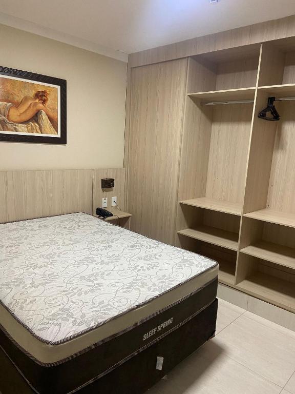 Postel nebo postele na pokoji v ubytování Piazza diRoma com acesso ao Acqua Park e Splash