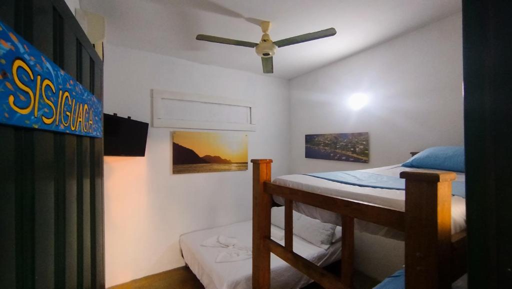 Postel nebo postele na pokoji v ubytování Villa Mary Hostel