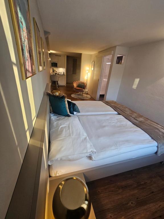 Postel nebo postele na pokoji v ubytování Apart-Hôtel Pont-de-Thielle