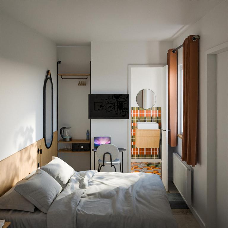 Postel nebo postele na pokoji v ubytování Hôtel De L'Ill
