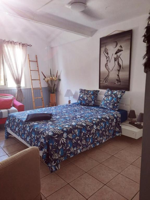 Postel nebo postele na pokoji v ubytování Villa proche lagon 5 pers à Etang-Salé les Bains