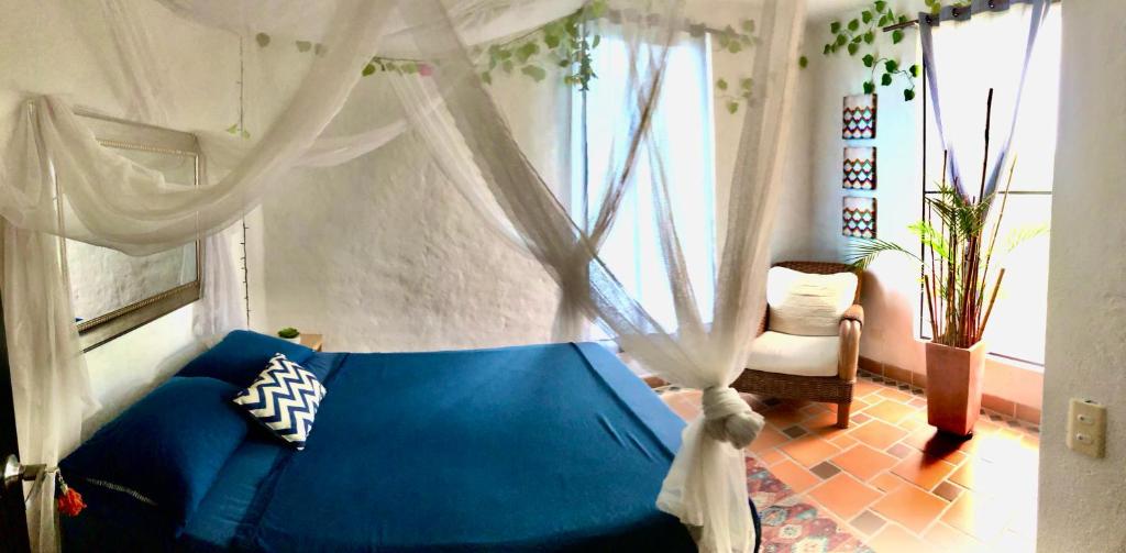 Voodi või voodid majutusasutuse Coccoloba Hotel toas