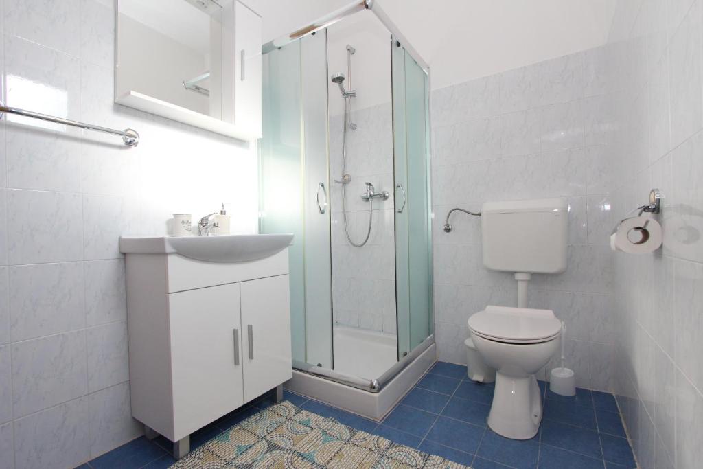 Koupelna v ubytování Apartments Eni