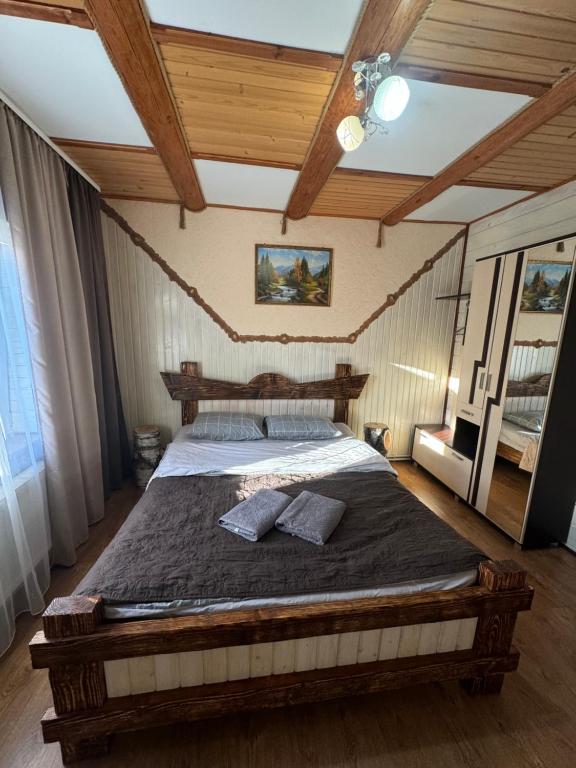 Postel nebo postele na pokoji v ubytování ГІРСЬКІ ПОДОРОЖі