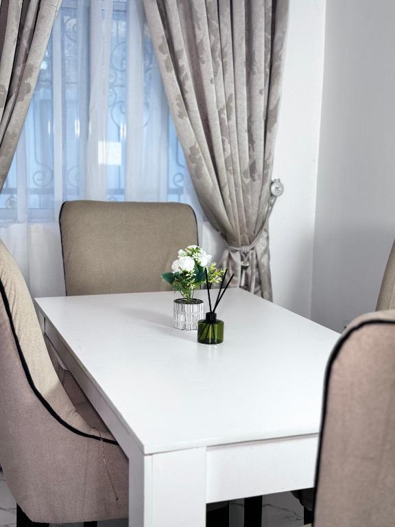 Posezení v ubytování Goldeekoin Apartment and Hotel